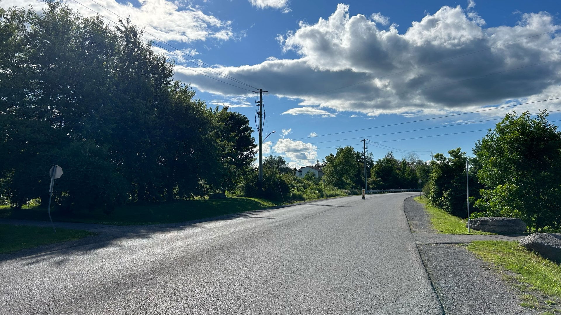 Sweetnam Drive looking north, near the pathway crossing