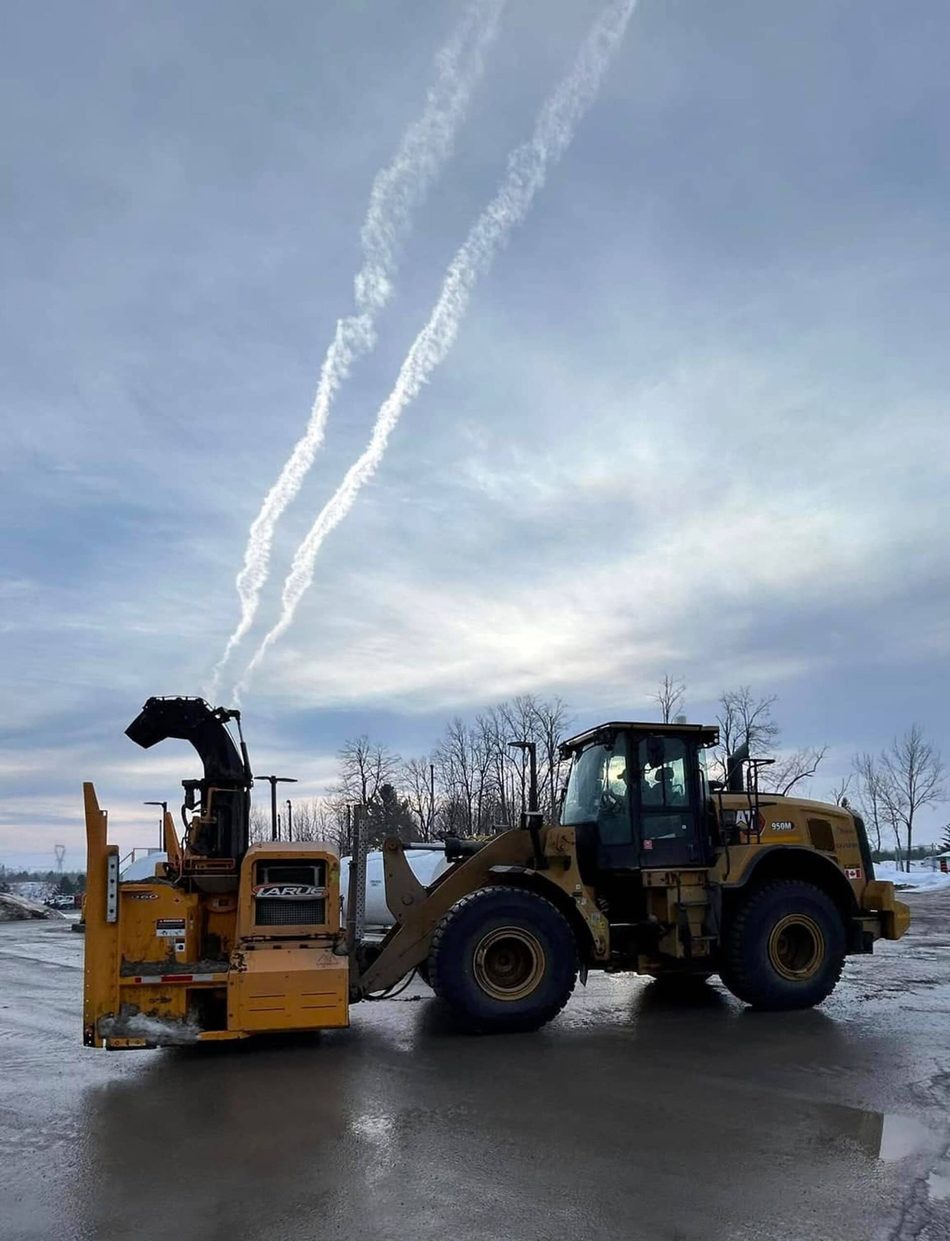 A snow blowing machine
