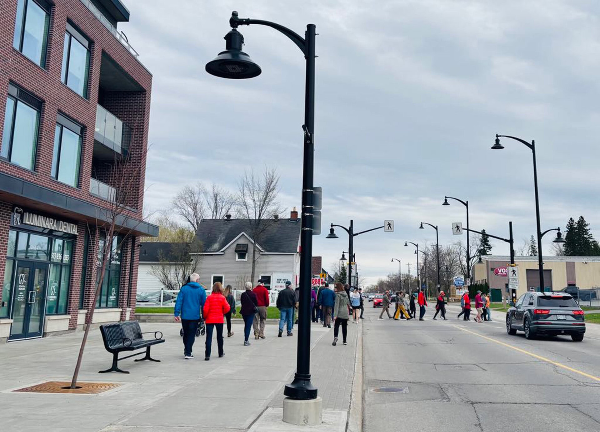 Jane's Walk 2025 on Stittsville Main Street. Walking in front of switzer