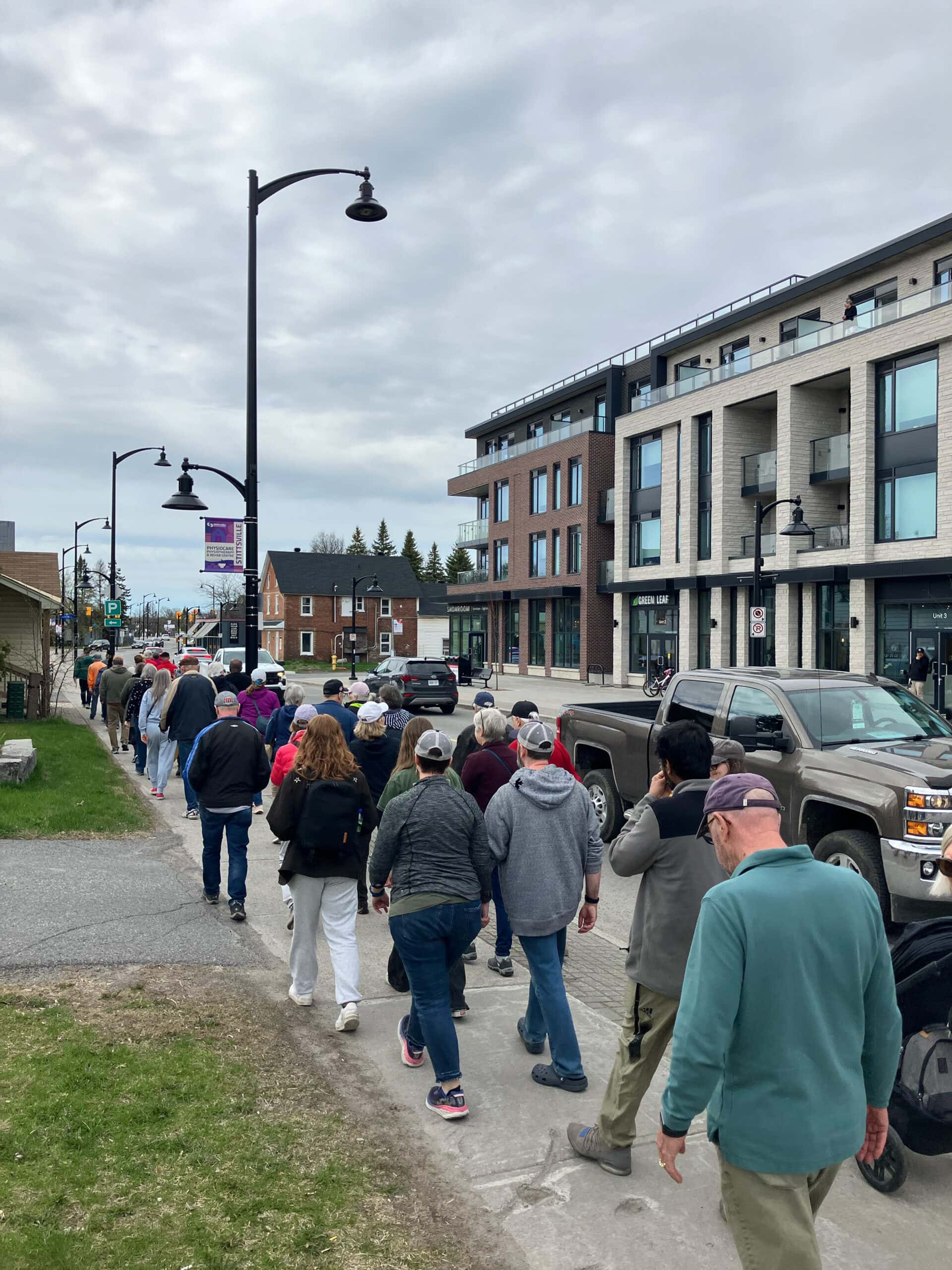Jane's Walk 2025 on Stittsville Main Street. Walking across from Switzer