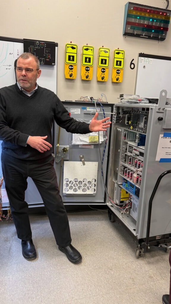 Traffic Operations Manager Stuart Edison showed us a control box being built for a new intersection. Each box is a big computer that controls traffic lights. They go through extensive testing before they're deployed.