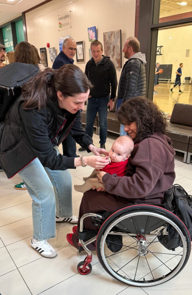 Celebrating Collinda Joseph Day on April 4, 2026. Collinda with a baby