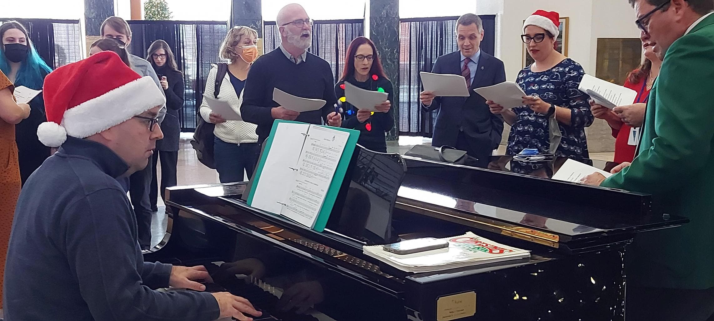 Christmas Carols at Ottawa City Hall around the piano