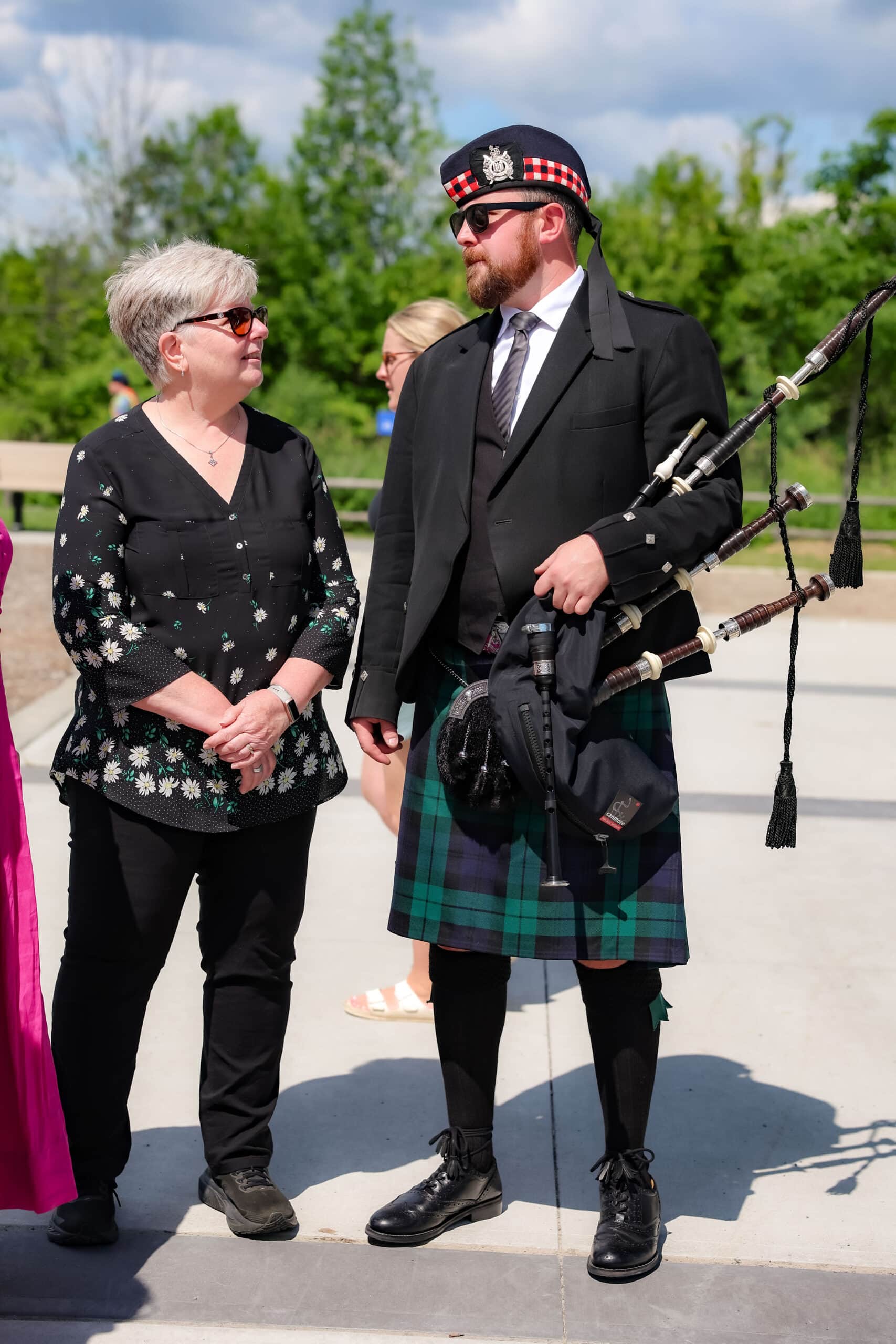 Roger Griffiths Avenue street naming ceremony. Bagpiper Jordan McConnell