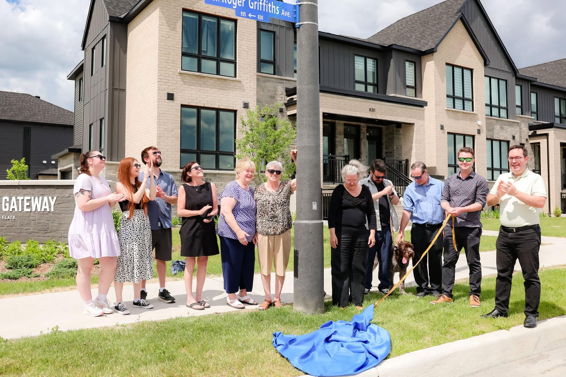 Roger Griffiths Avenue street naming ceremony. Family unveils the sign