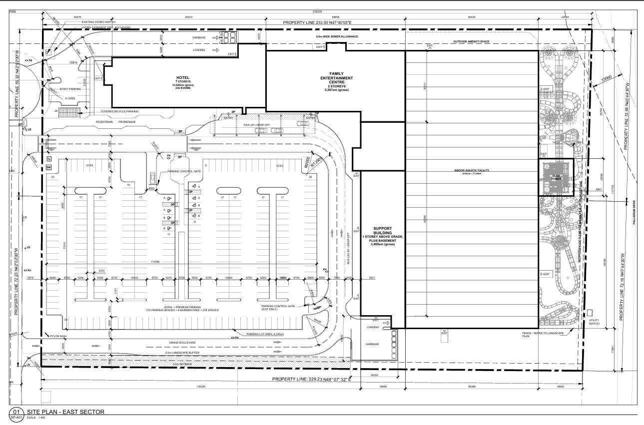 Site plan for a recreational complex, showing three buildings arranged in an L-shape around a parking lot.